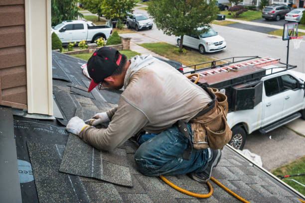 Professional Roofing technician working in Alma, KS